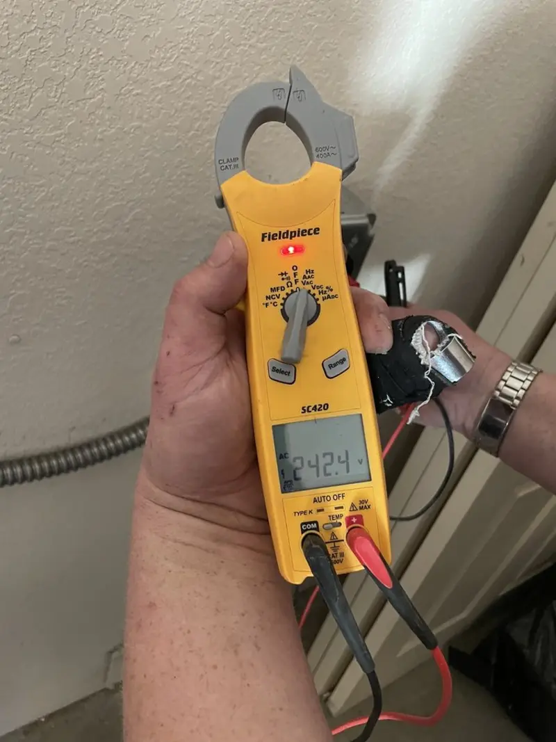 Voltage testing with clamp meter during Generator Installation in Charleston